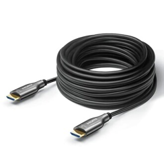 Coiled black HDMI cable with connectors.